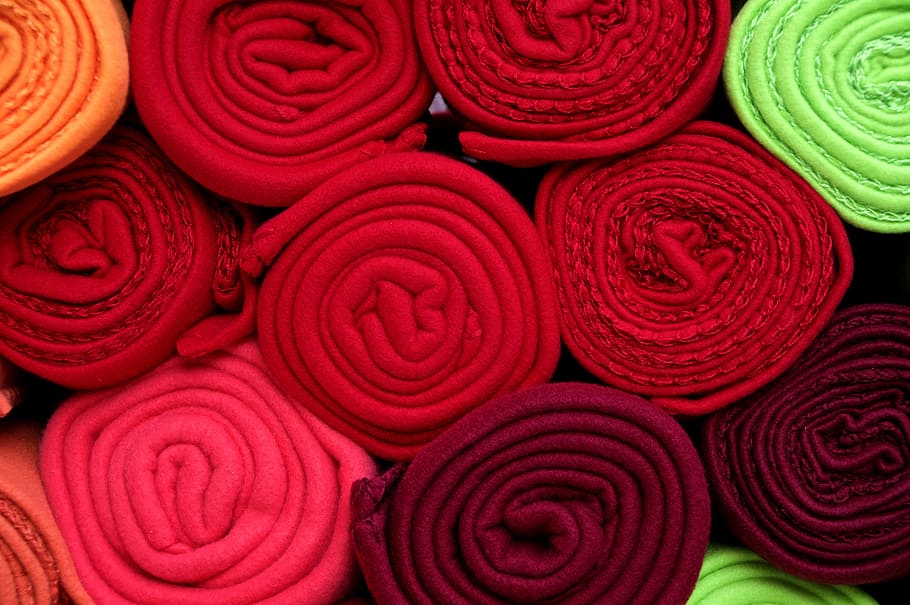 pile, assorted-color textile rolls, fabric, wool, roll, decoration, goods, sale, display, color