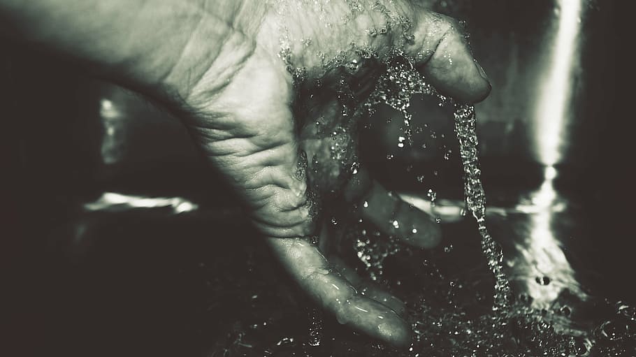 person holding water, person, touching, water, grayscaled, black and white, hand, fingers, running water, drop