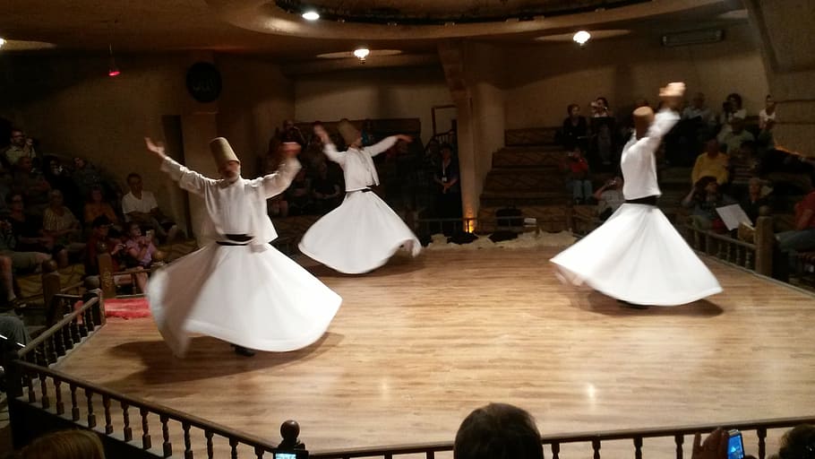three men dancing, dance, dervishes, turkey, konya, mevlana, wedding, people, bride, women