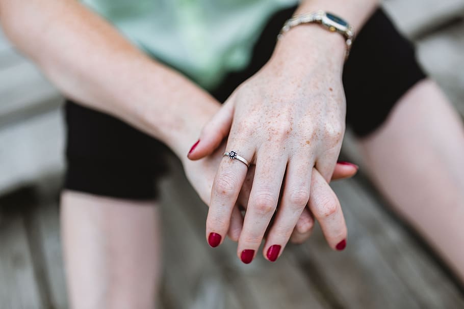 female, woman, hands, jewellery, jewelery, jewelry, ring, freckles, red nails, manicure