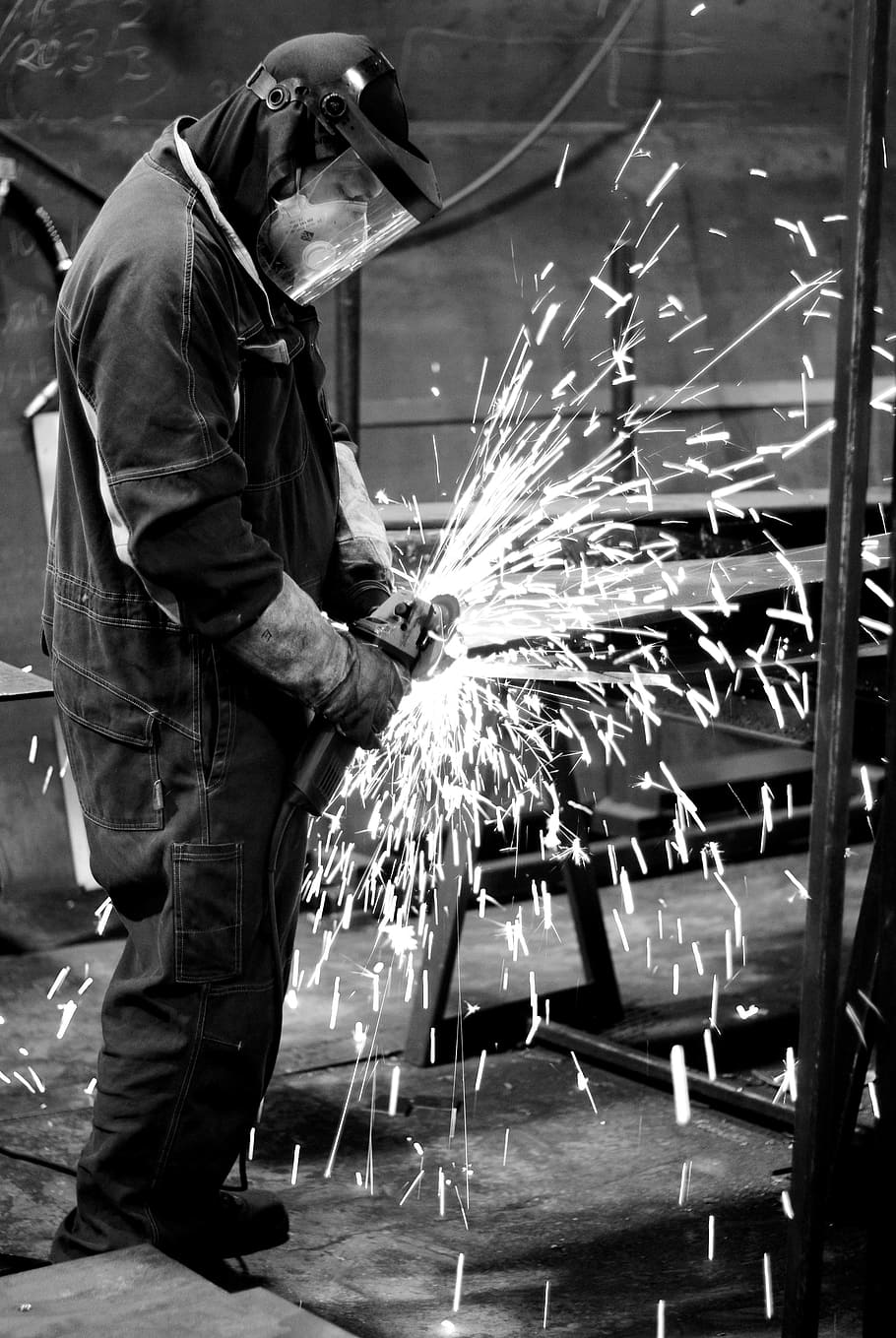 greyscale photography, person, using, hand tool, welding, industry, steel, mask, welder, engineering