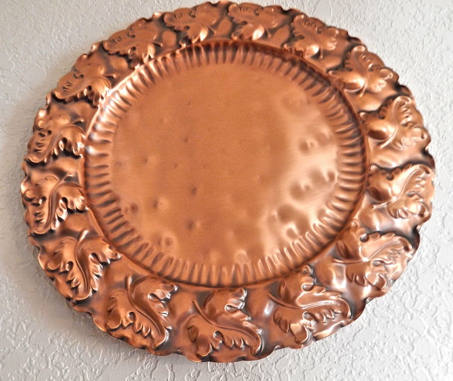 copper plate, design, wall plate, metal, indoors, close-up, studio shot, single object, directly above, still life