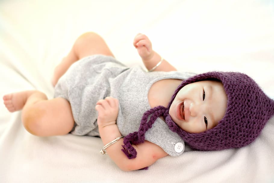 baby, wearing, purple, aviator hat, paternity, child care, child, cute, small, lying Down