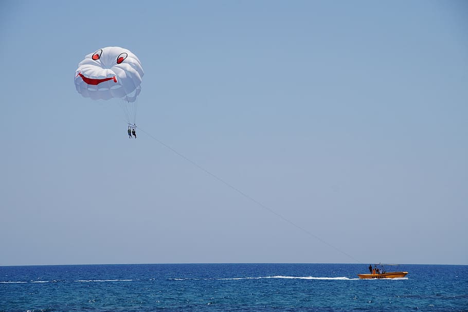 parasailing, paragliding, water sport, sea, fun, parachute, water, sky, nautical vessel, transportation