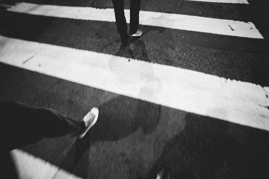 crosswalk, street, pavement, shoes, shadows, night, evening, human leg, human body part, low section