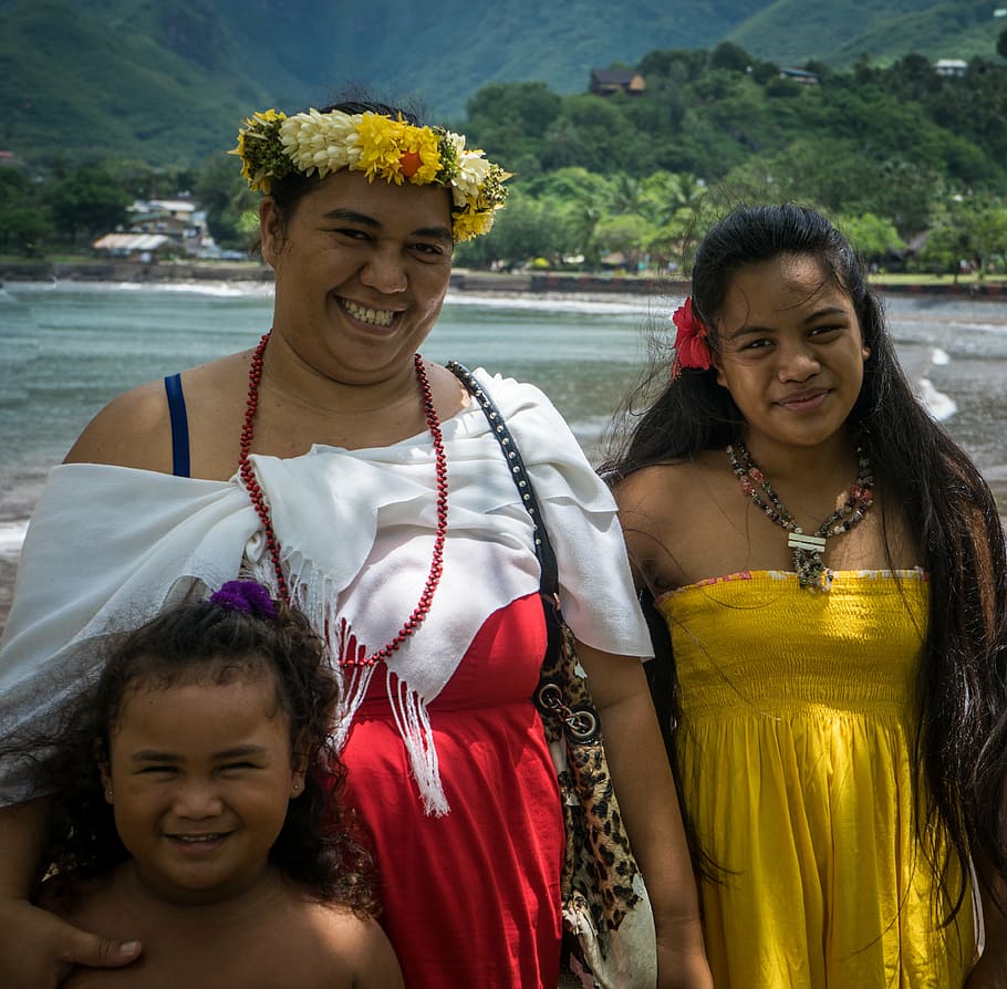 woman, wearing, yellow, strapless dress, polynesian family, portrait, beach, nuku hiva, marquesas islands, tropical