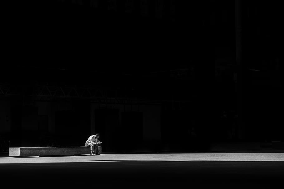 grayscale photo, man, sitting, bench, greyscale, photography, dark, alone, thinking, light