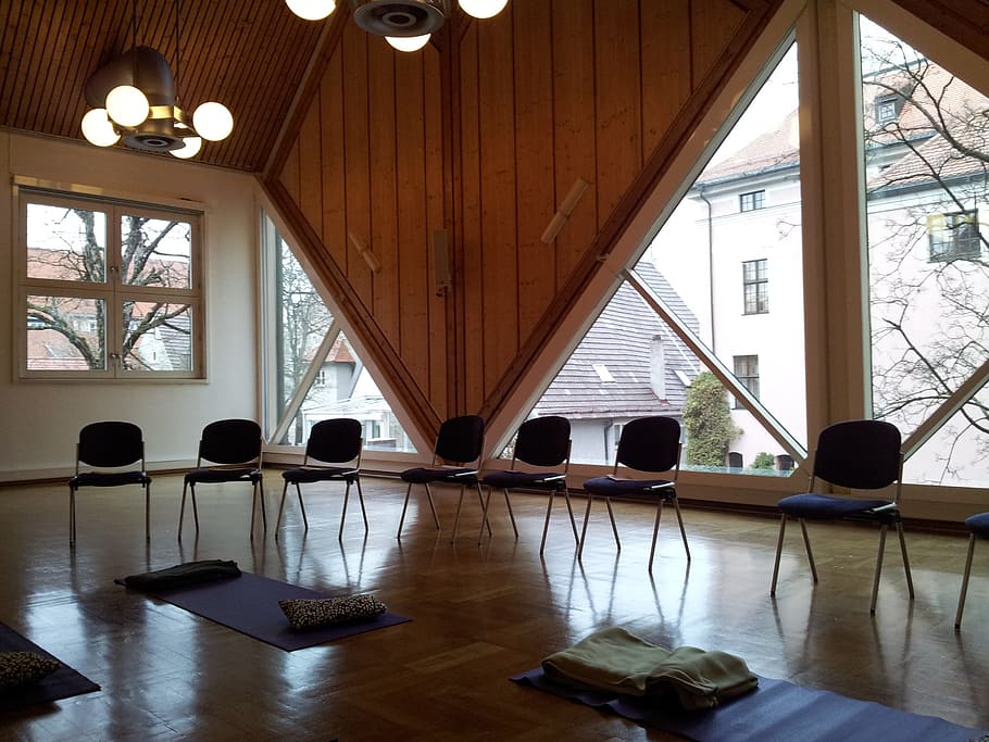 chairs near window, seminar room, yoga room, meditation, indoors, window, flooring, lighting equipment, day, architecture