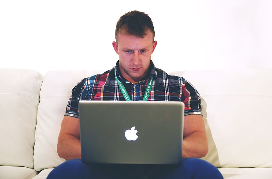 man, using, gray, sofa, macBook, lancer, typing, notebook, laptop, startup