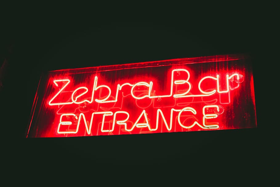 turned-on, zebra, bar, entrance, neon, light, signage, dark, night, red