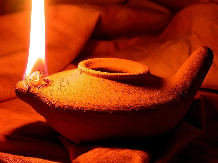 lit lamp, oil lamp, clay pot, light, pottery, earthenware, lantern, decorative, craft, close-up