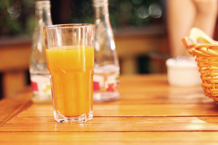 clear, drinking glass, brown, wooden, surface, juice, orange, restaurant, food, drinking