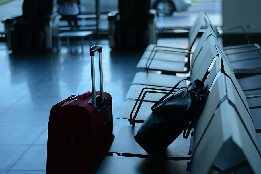 black, bucket bag, white, gang chair, maroon, luggage, floor, inside, room, airport