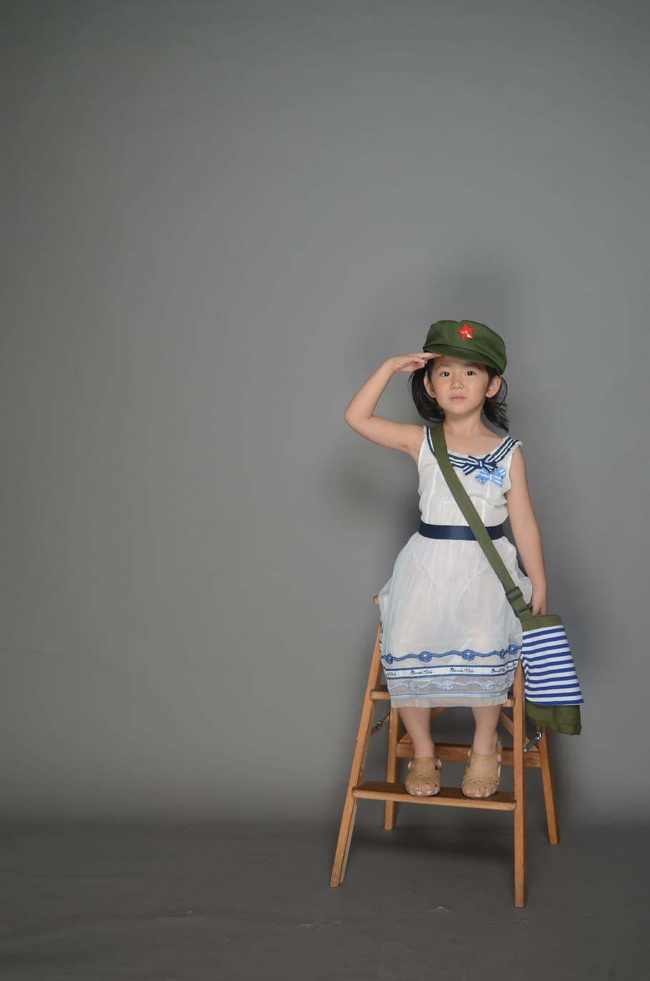 cute, military cap, army backpack, child, girls, studio, original photo, chair, one Person, people
