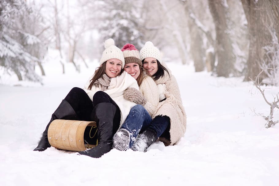 three, women, smiling, sitting, white, snow, three women, happy, joy, girls