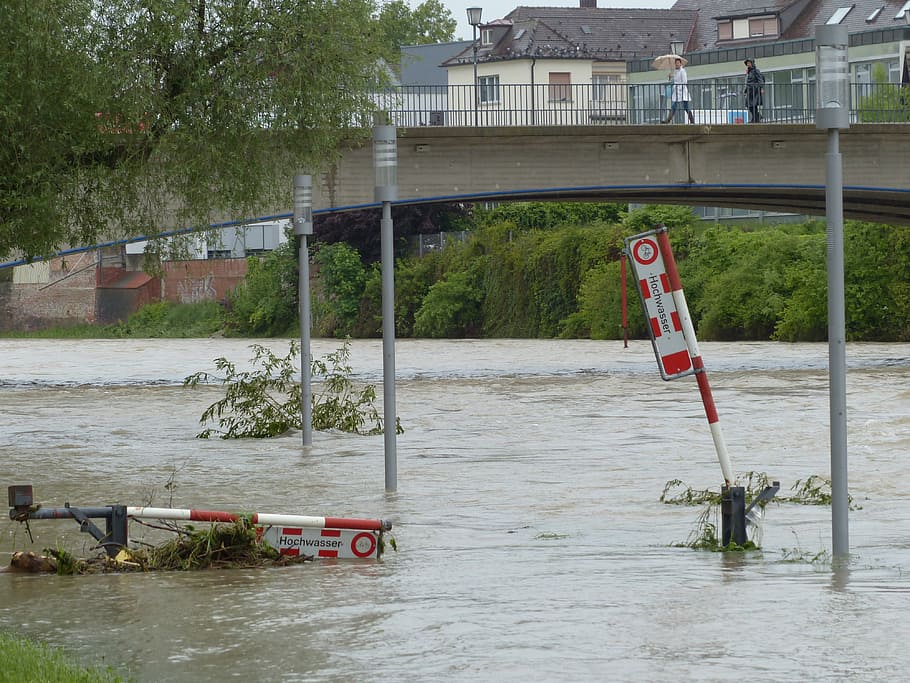 person, umbrella, walking, bridge, daytime, high water, road, locked, damage, flood damage