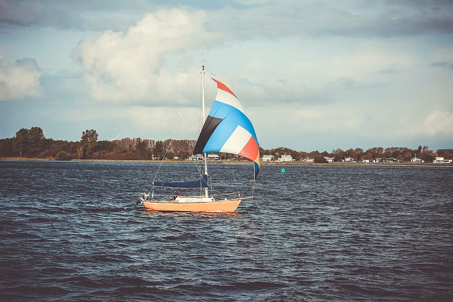 brown, sailboat sailing, daytime, sailing, boat, sea, ocean, blue, water, wave