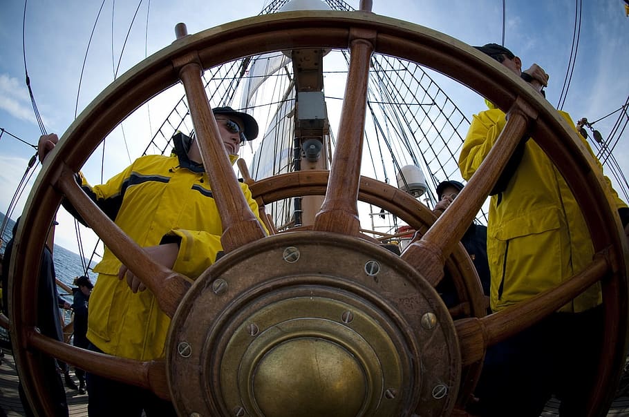 two, men, wearing, yellow, overalls, ship wheel, daytime, ship, wheel, helm
