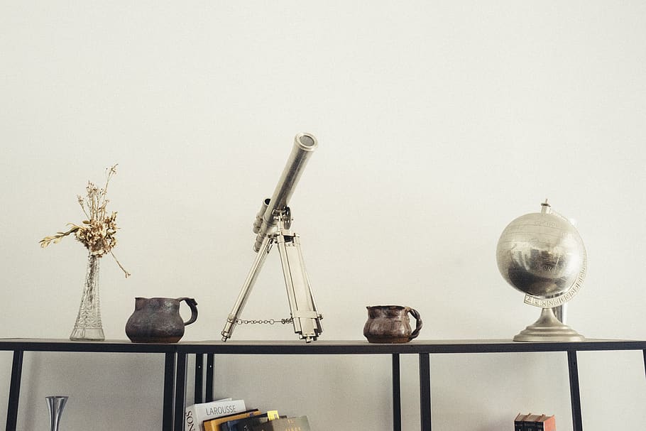 telescope, globe, vase, flowers, shelf, hooks, wall, display, indoors, variation