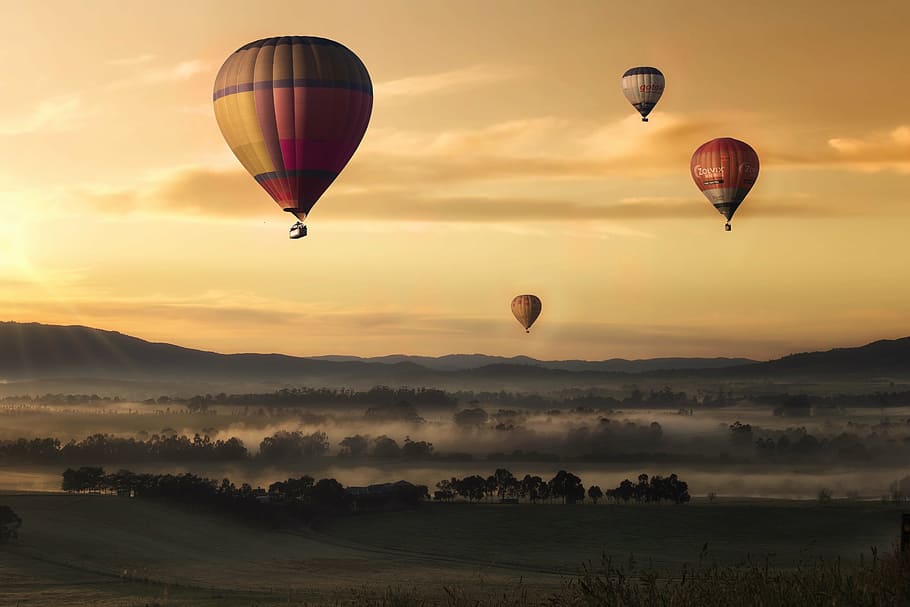 several, hot, air balloons, ground photo, hot air, balloon, valley, sky, yellow, floating