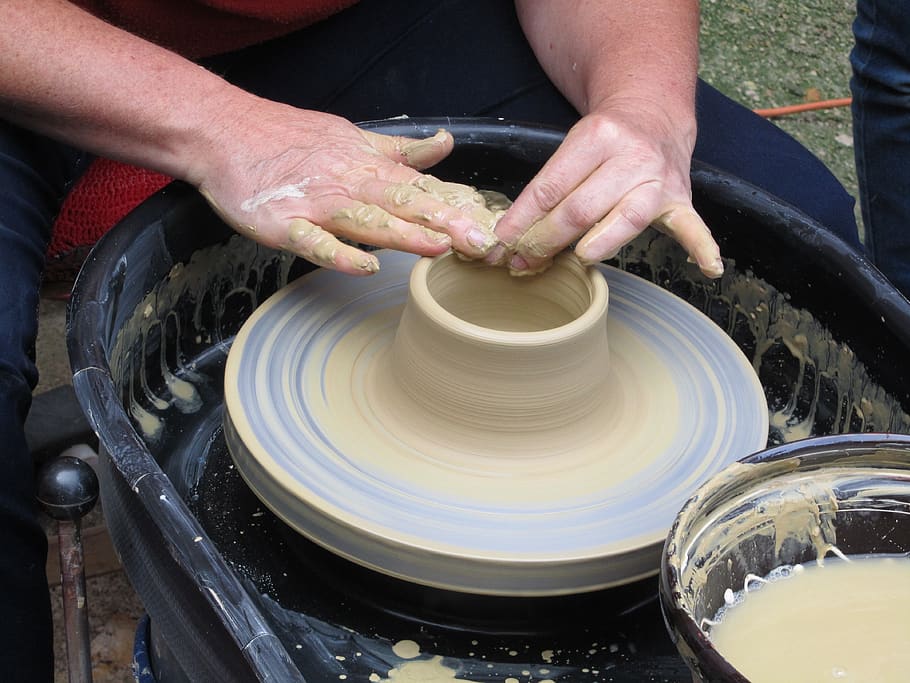 pottery, potter's wheel, crock, spinning, motion, human hand, molding a shape, making, hand, craft