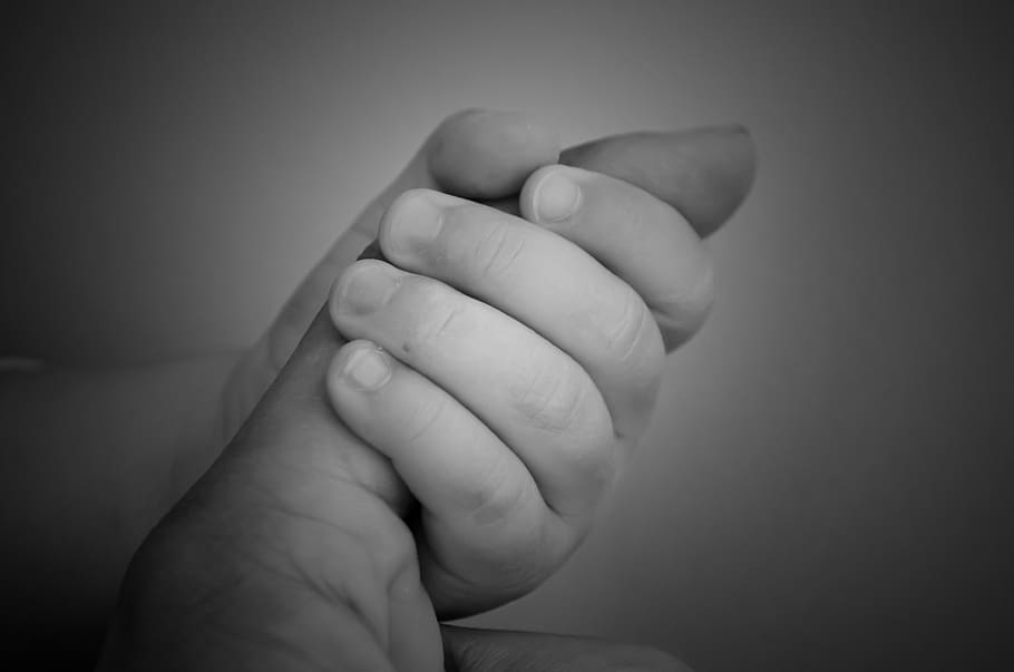 grayscale photo, baby, holding, index finger, maternal love, love, loyalty, trust, mom, dad
