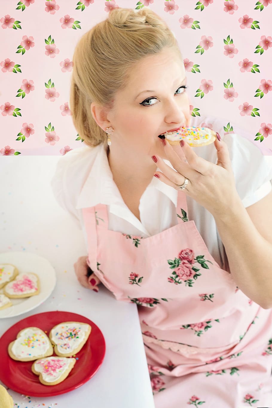 woman, pink, floral, apron, eating, cookies, baking, cookie decorating, pretty woman, baker