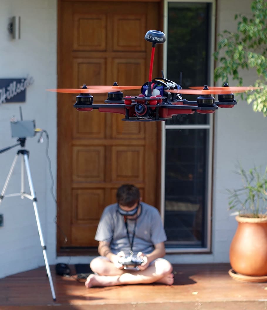man, sitting, floor, tripod, drone, quadcopter, control, stability, flight, flying