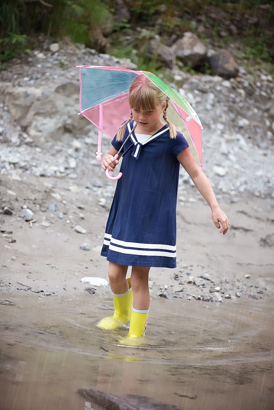 girl, holding, umbrella, wearing, boots, person, human, child, water, wet