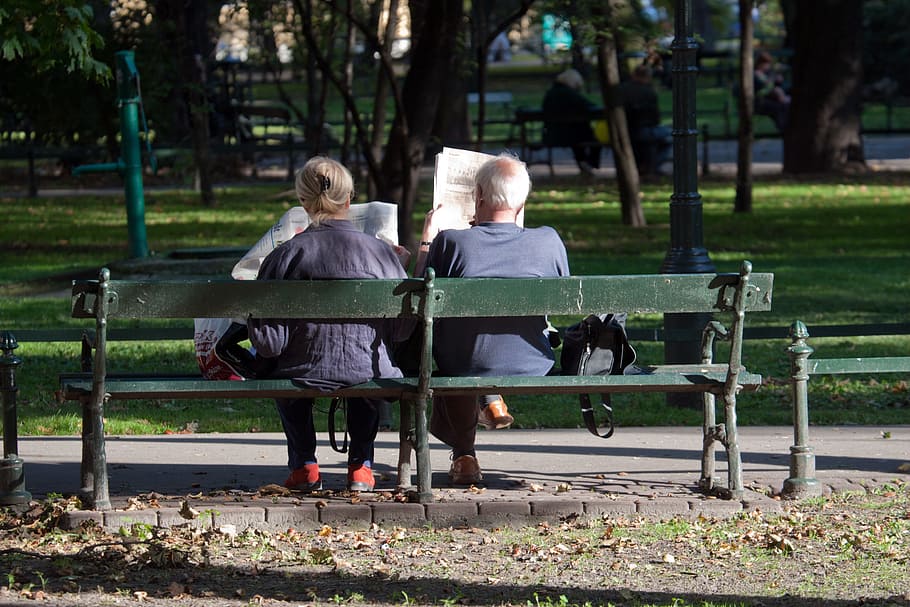 man, woman, sitting, green, wooden, bench seat, daytime, man and woman, wooden bench, french tourists