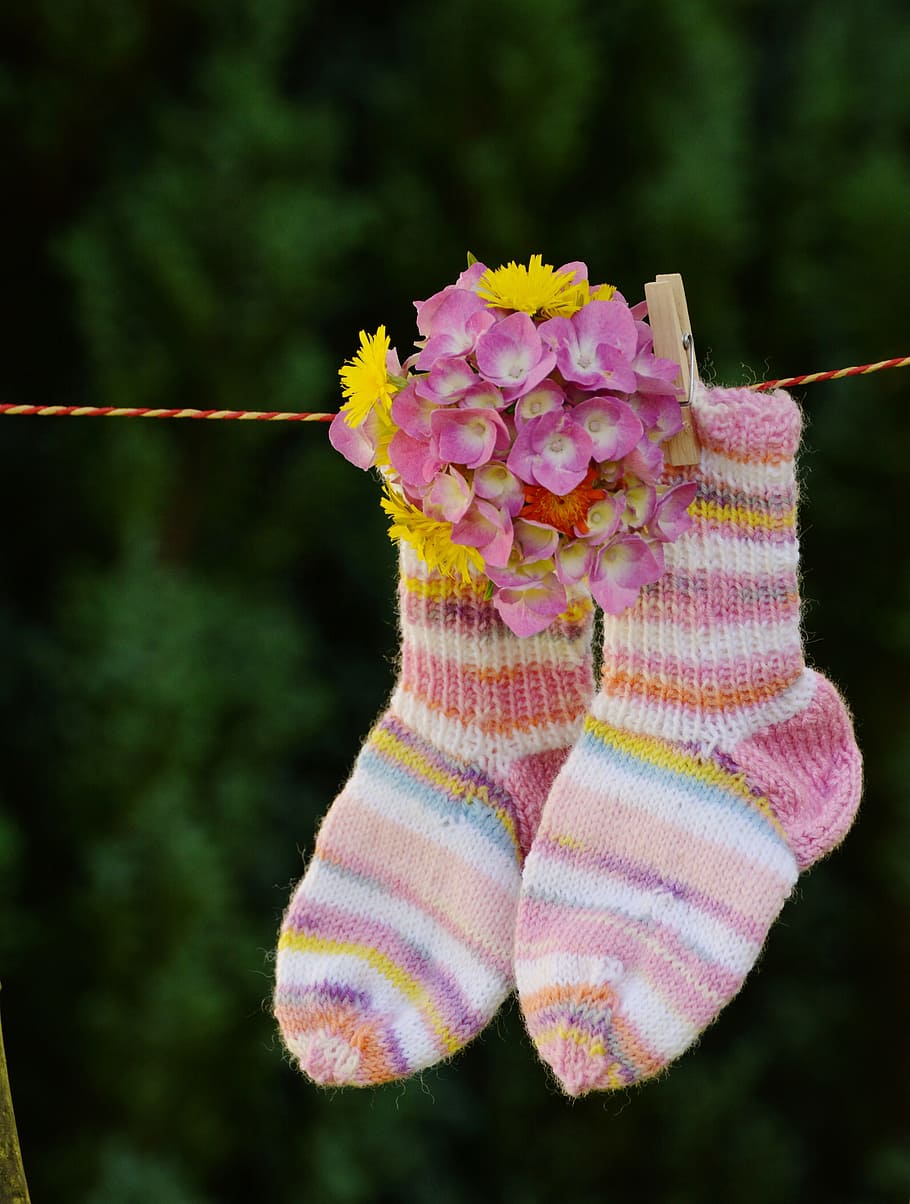 shallow, focus photo, pair, multicolored, socks, hanging, red, yellow, rope, ankle socks