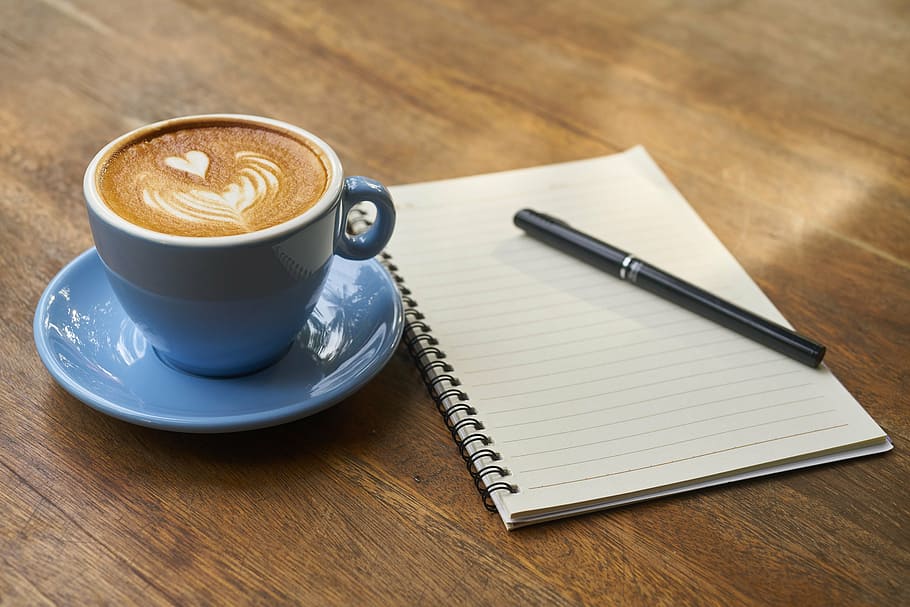 black, white, electronic, device, cup, espresso, saucer, spiral note, coffee, pen