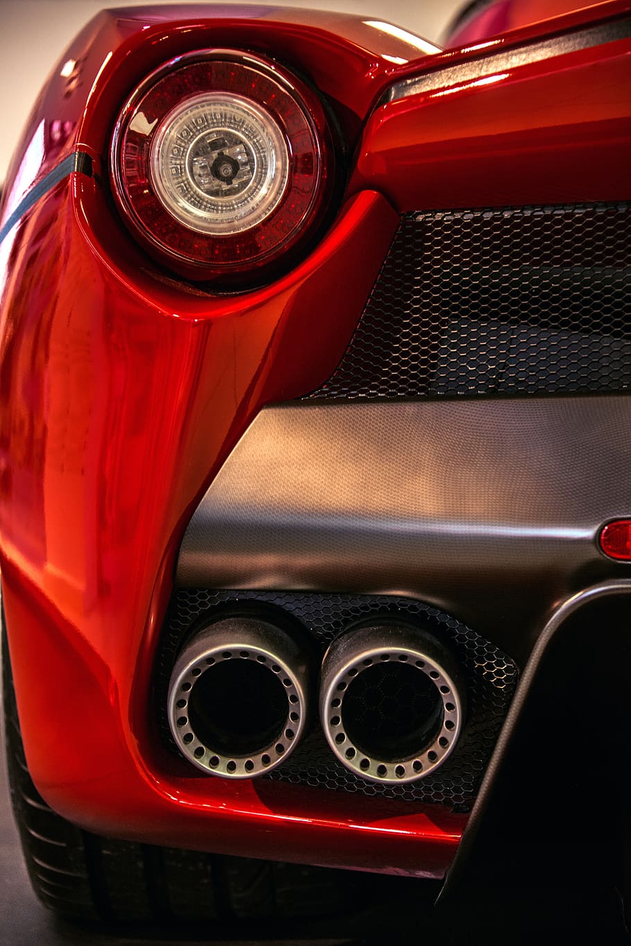 close-up photo, red, sports coupe taillight, auto, ferrari, tail lights, rossa, rear view, made in italy, silencer