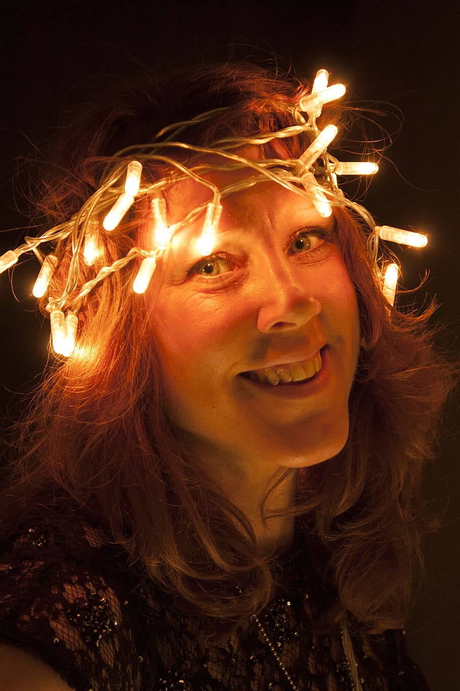 christmas, light chain, woman, headshot, portrait, one person, front view, young adult, hair, lifestyles