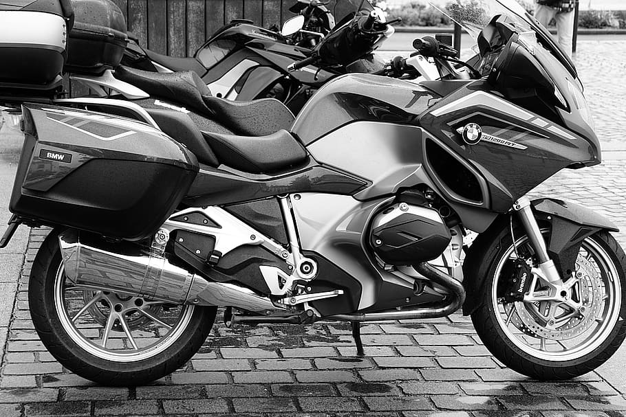 black and white, motorcycle, motorbike, big bike, vehicle, outside, transportation, mode of transportation, land vehicle, street