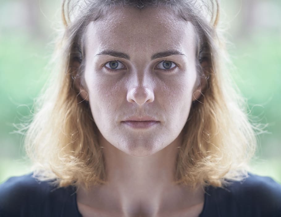woman, blonde, symmetry, sad, angry, serious, portrait, face, headshot, looking at camera