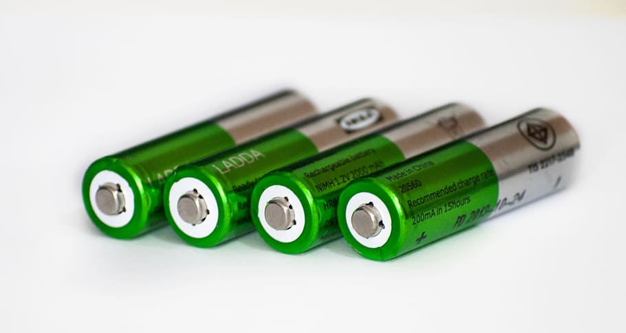 Batteries, Energy, Rechargeable, Power, green Color, close-up, white background, studio shot, environmental issues, indoors