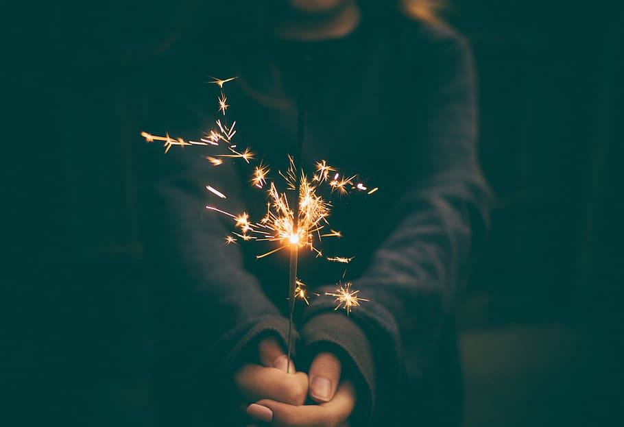 person, hand, holding, fireworks, celebrate, celebration, firework, flame, night, sparkler