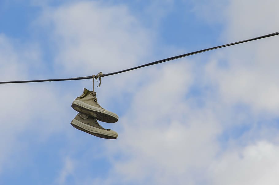 boots, power cable, phone cord, telephone wire, säkölanka, clouds, sky, converse, hanging, rope