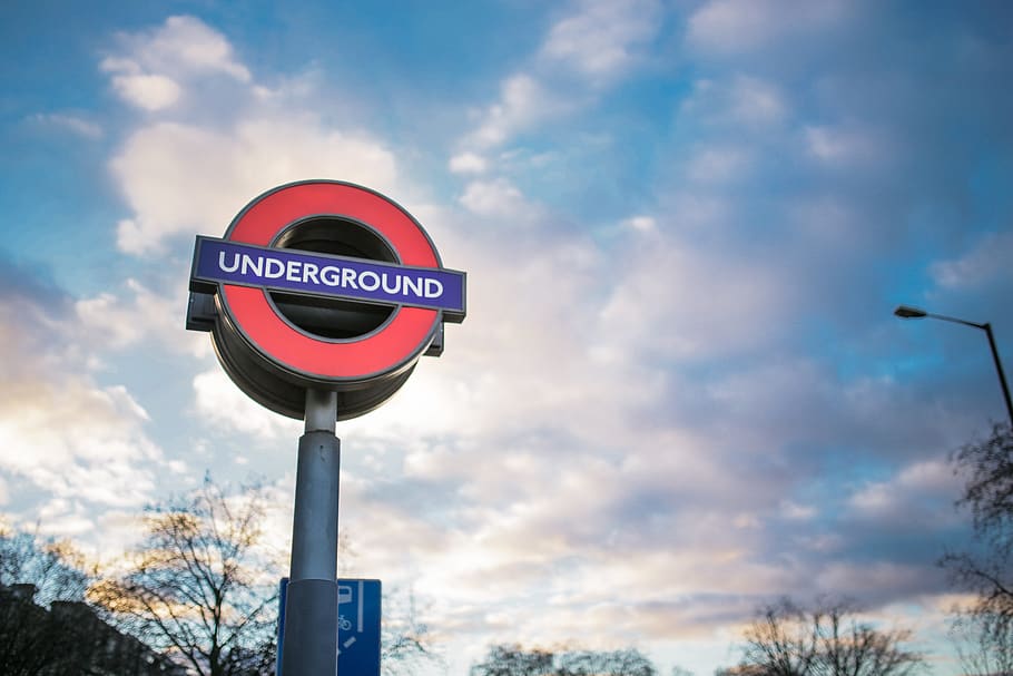 london, underground, clouds, train, metro, sky, communication, cloud - sky, sign, road sign