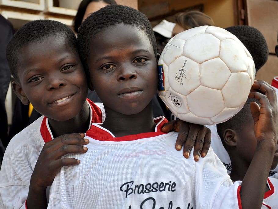 two, boy, wearing, white, t-shirt, holding, soccer ball, children, togo, black