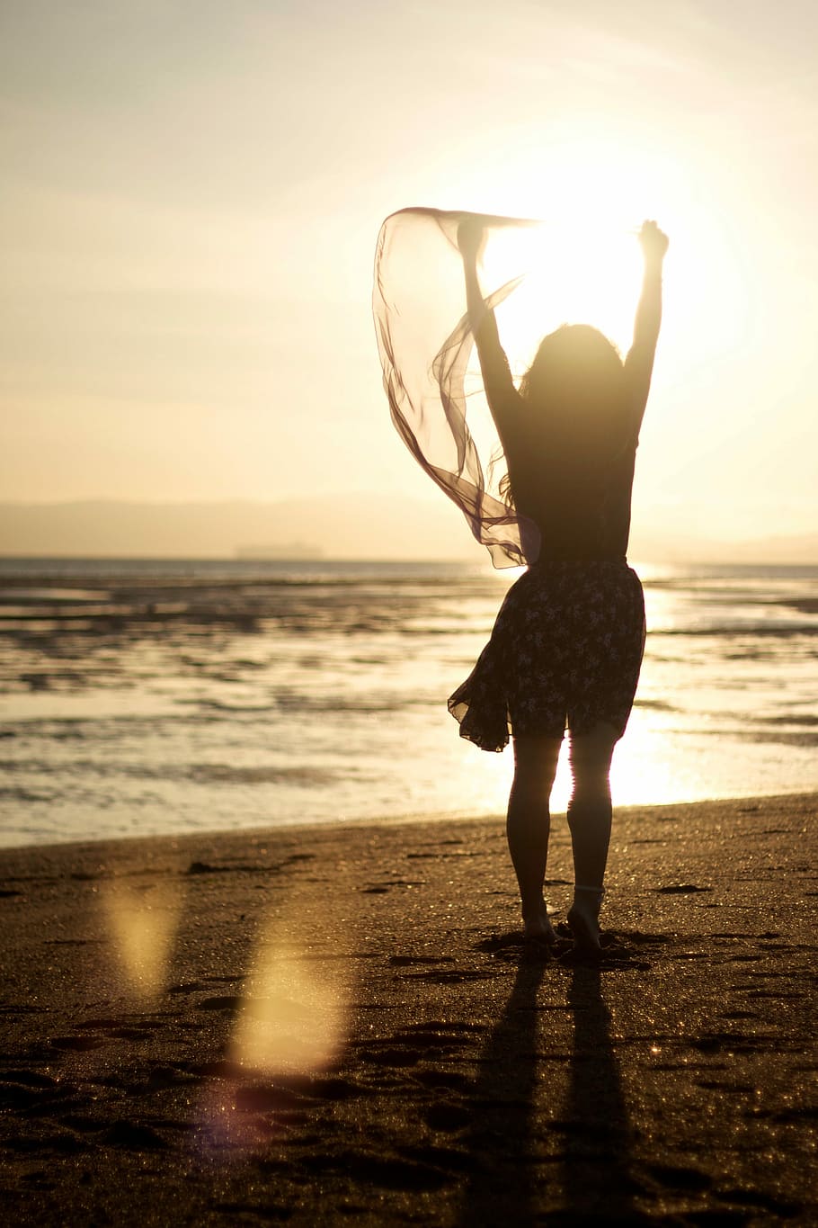 woman, holding, scarf, standing, beach shore, sunset, beach, shore, sea, silhouette