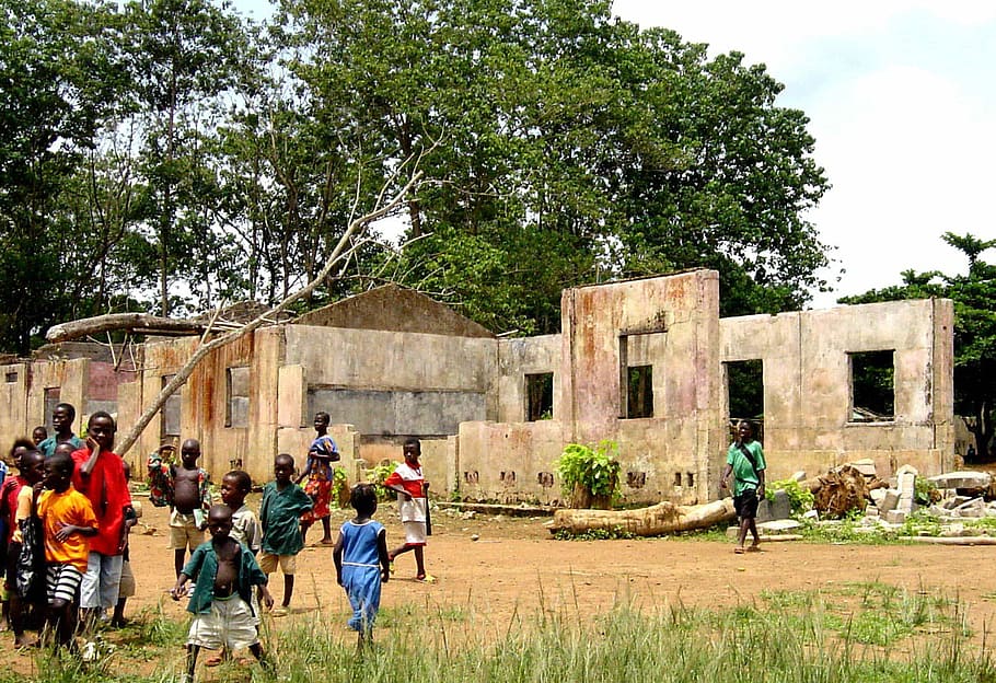 School, Koindu, Sierra Leone, burned building, photos, kids, public domain, people, outdoors, medium group of people