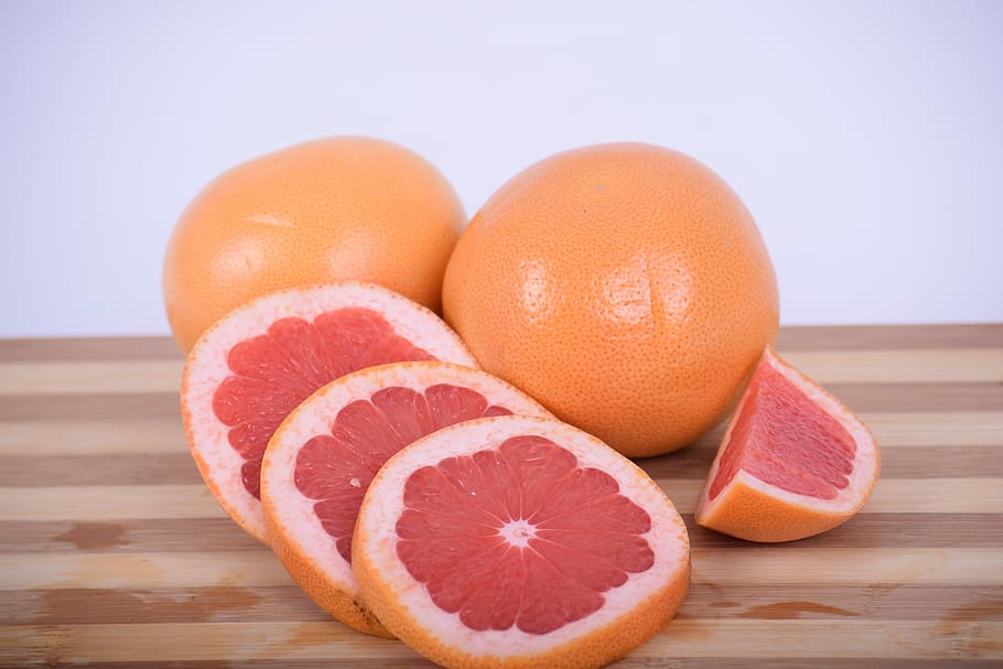 sliced, orange, brown, wooden, chopping, board, Citrus, grapefruit, grapefruit red, subtropical fruit