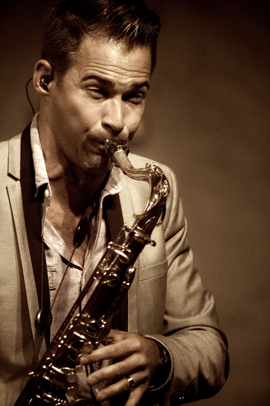 man playing saxophone, jazz artist, musician, sax, performance, music, jazz, solo, man, musical
