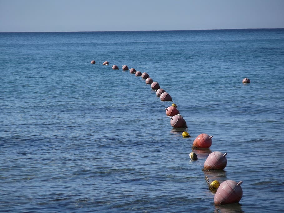 buoys, sea, water, ocean, demarcation, in a row, buoy, sky, beauty in nature, horizon