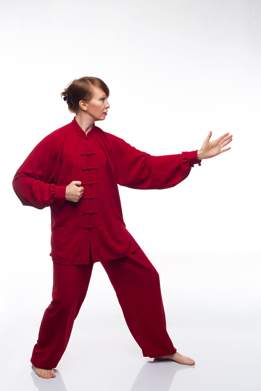 young, stand-alone, taijiquan, martial arts, qigong, taichi, woman, red, one person, white background