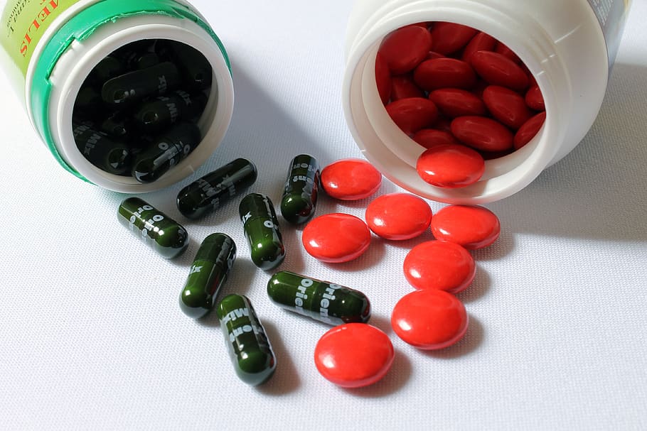 tablets, pills, vitamins, supplement, vitamin supplement, natural remedy, health, medicinal, indoors, red