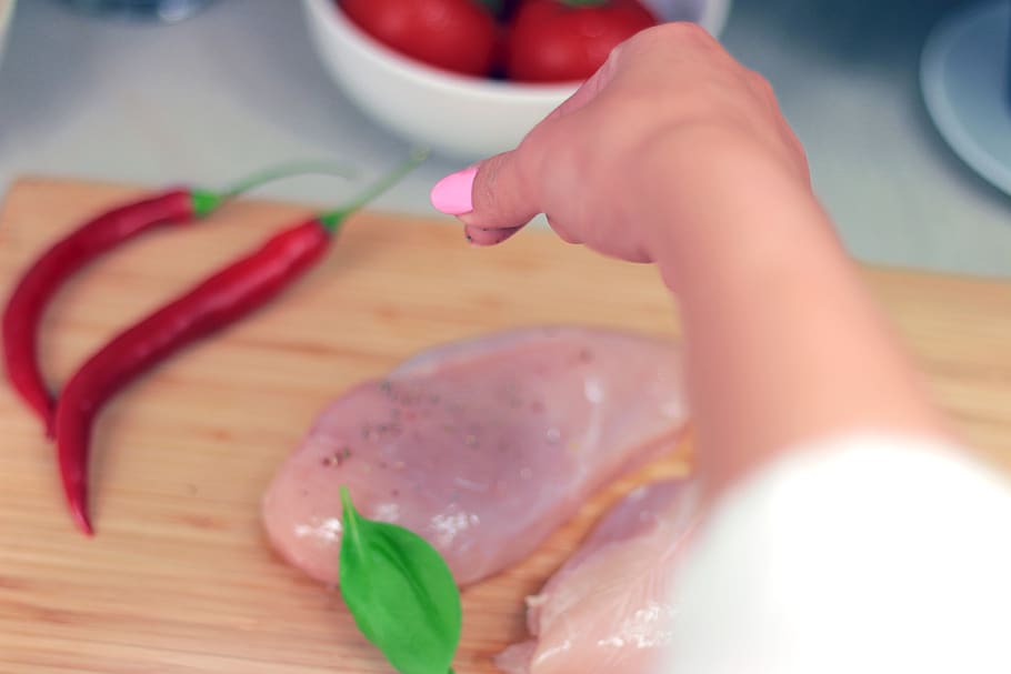 cooking, kitchen, food, ingredients, chicken, meat, peppers, cutting board, salt, pepper