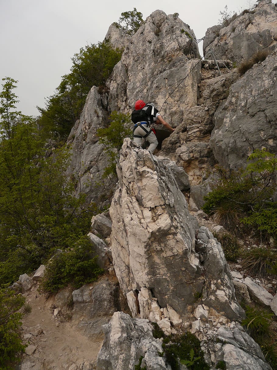 man, climbing, gray, rock formation, daytime, mountaineer, wanderer, person, hiking, equipment